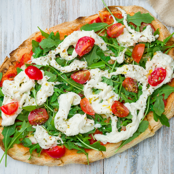 Pinsa With Tomatoes, Aragula And Stracciatella. Rome Pizza