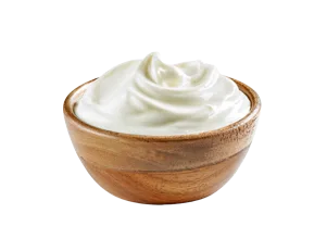 Creamy whipped yogurt or sour cream in a rustic wooden bowl, ideal for foodservice and commercial food supply applications.